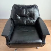 Vintage armchair published by Möbel Mann – elegant black