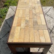 Vintage coffee table in rosewood and ceramic.