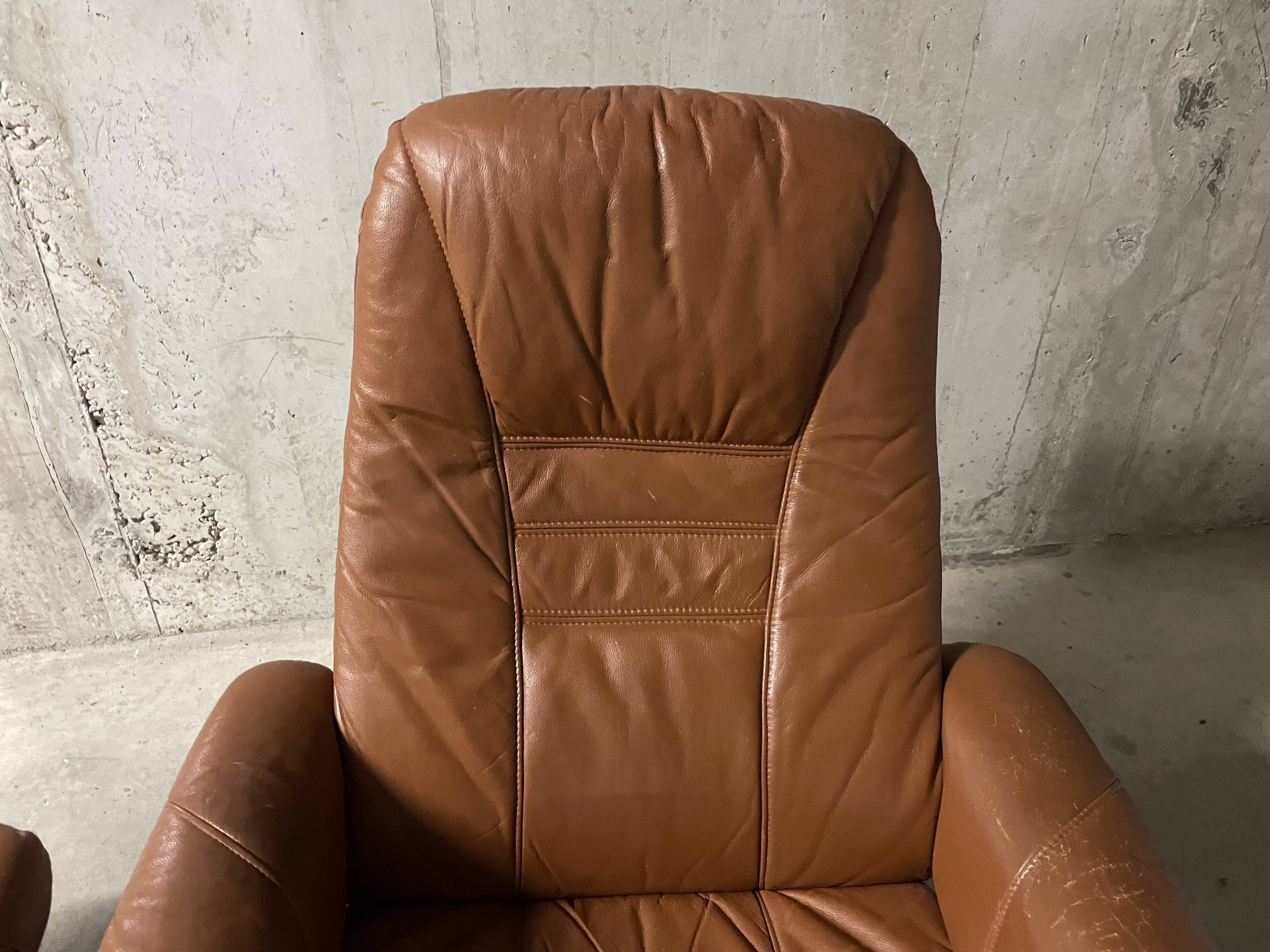 Unico leather armchair and ottoman