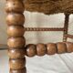 Corner chair in straw and turned wood, fireside chair.