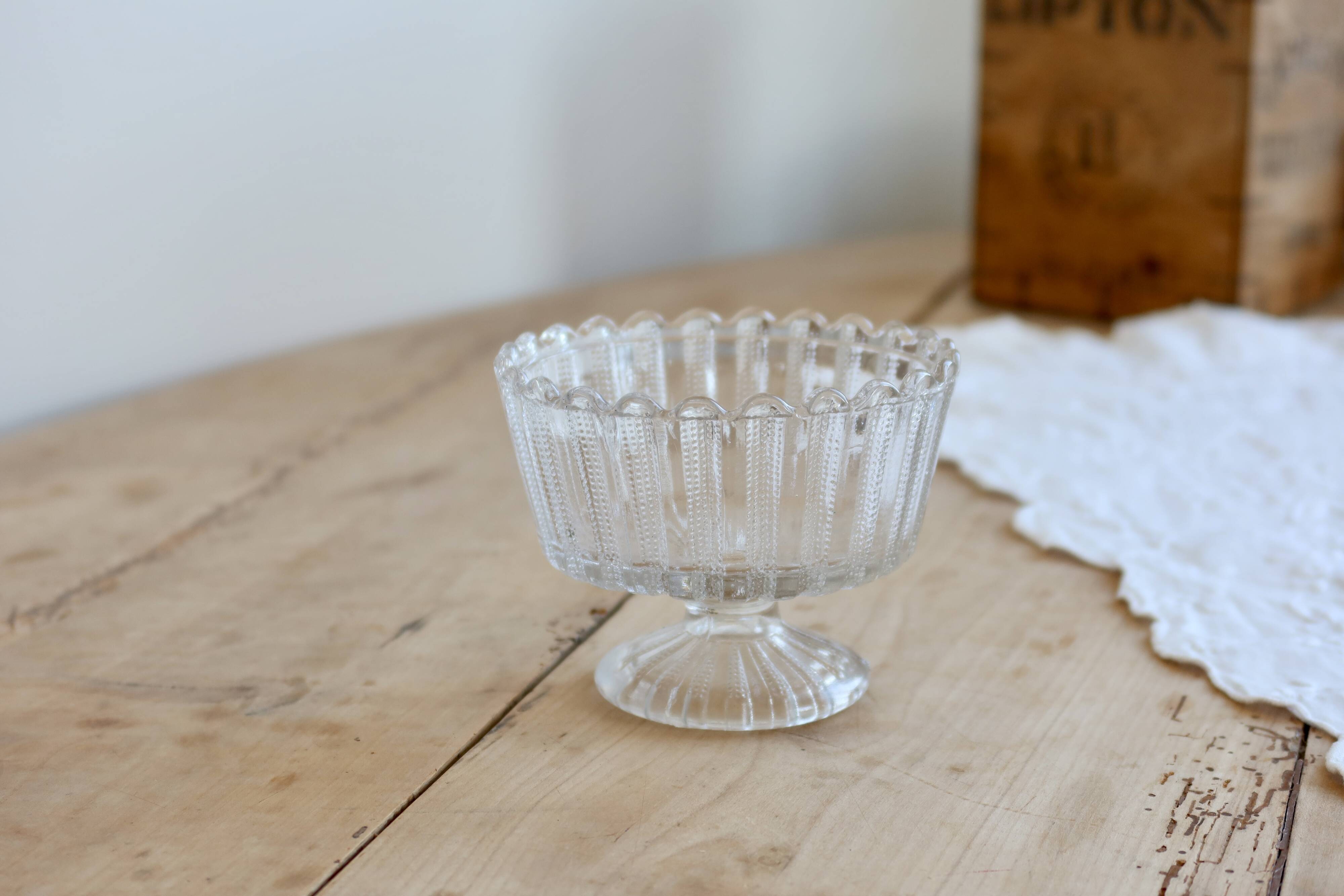 Vintage glass bowl on a pedestal