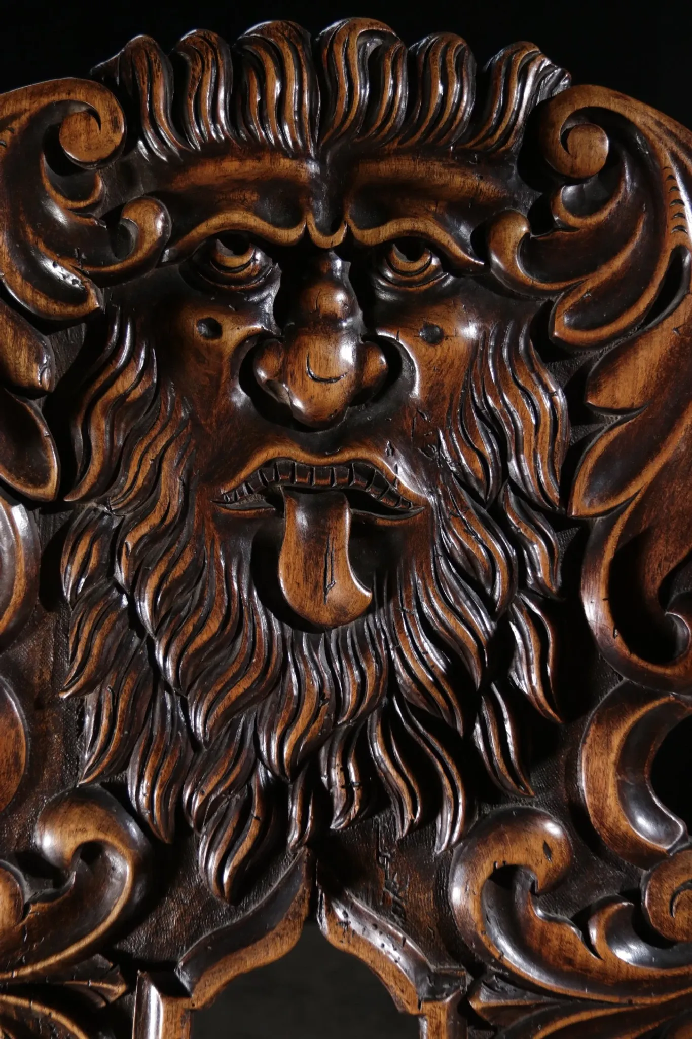 17th century Alpine carved walnut Brettstuhl armchair with grotesque mask