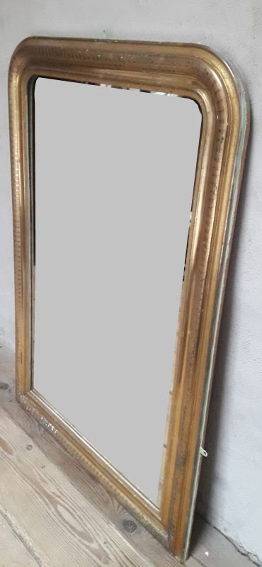 Golden Louis Philippe mirror H122xW84cm with gilded motifs.
