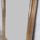 Golden Louis Philippe mirror H122xW84cm with gilded motifs.