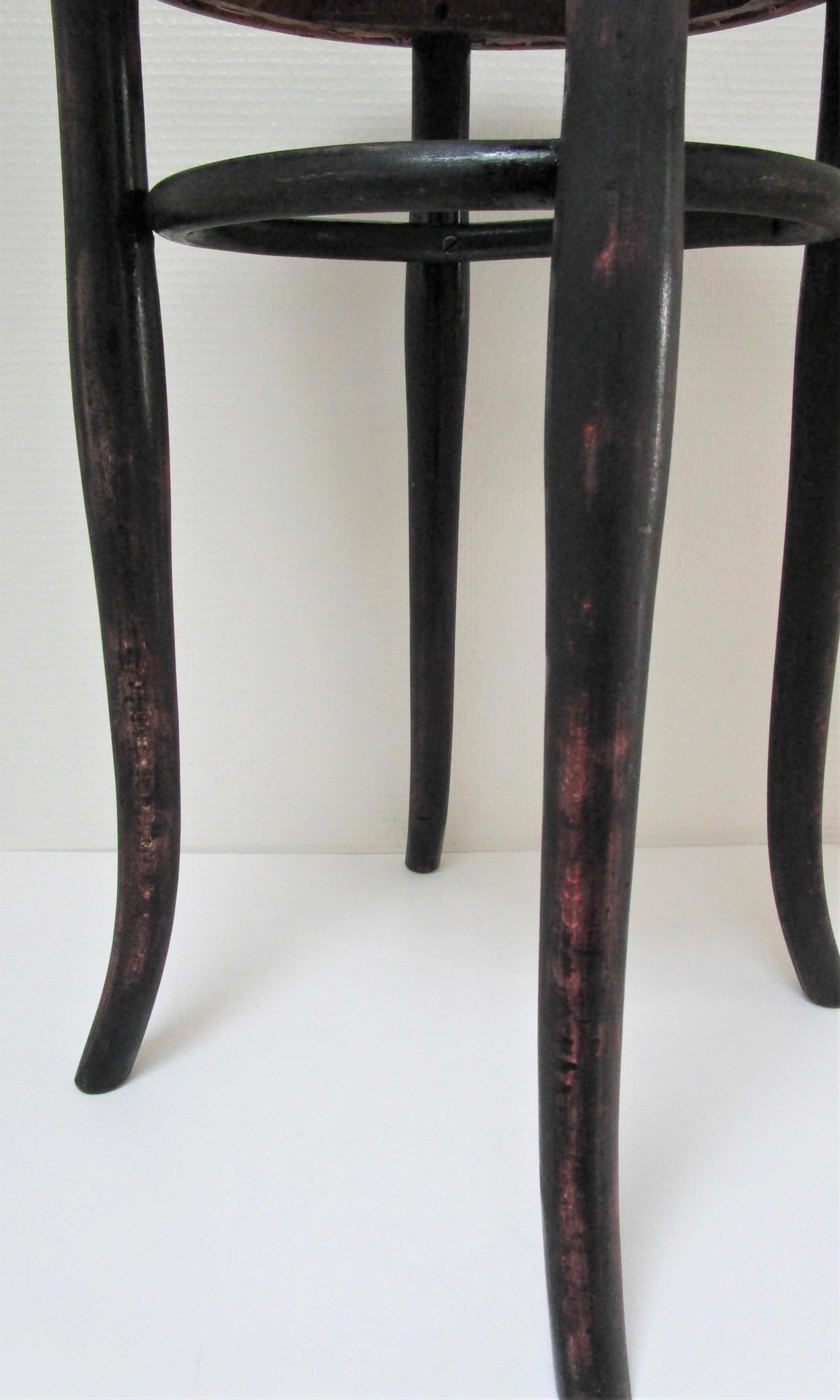 Black skated Thonet stool stamped