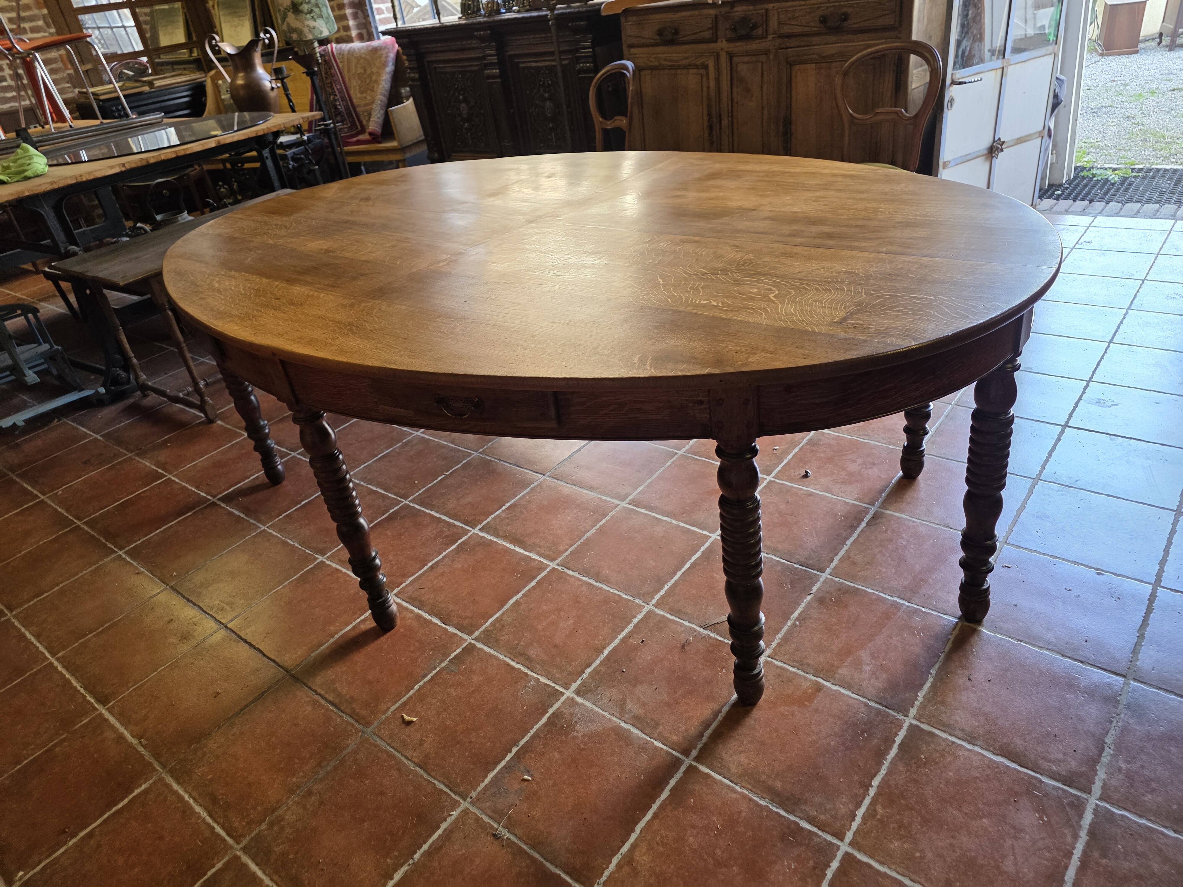 Large oval monastery table in solid oak, 19th century, 243×154cm