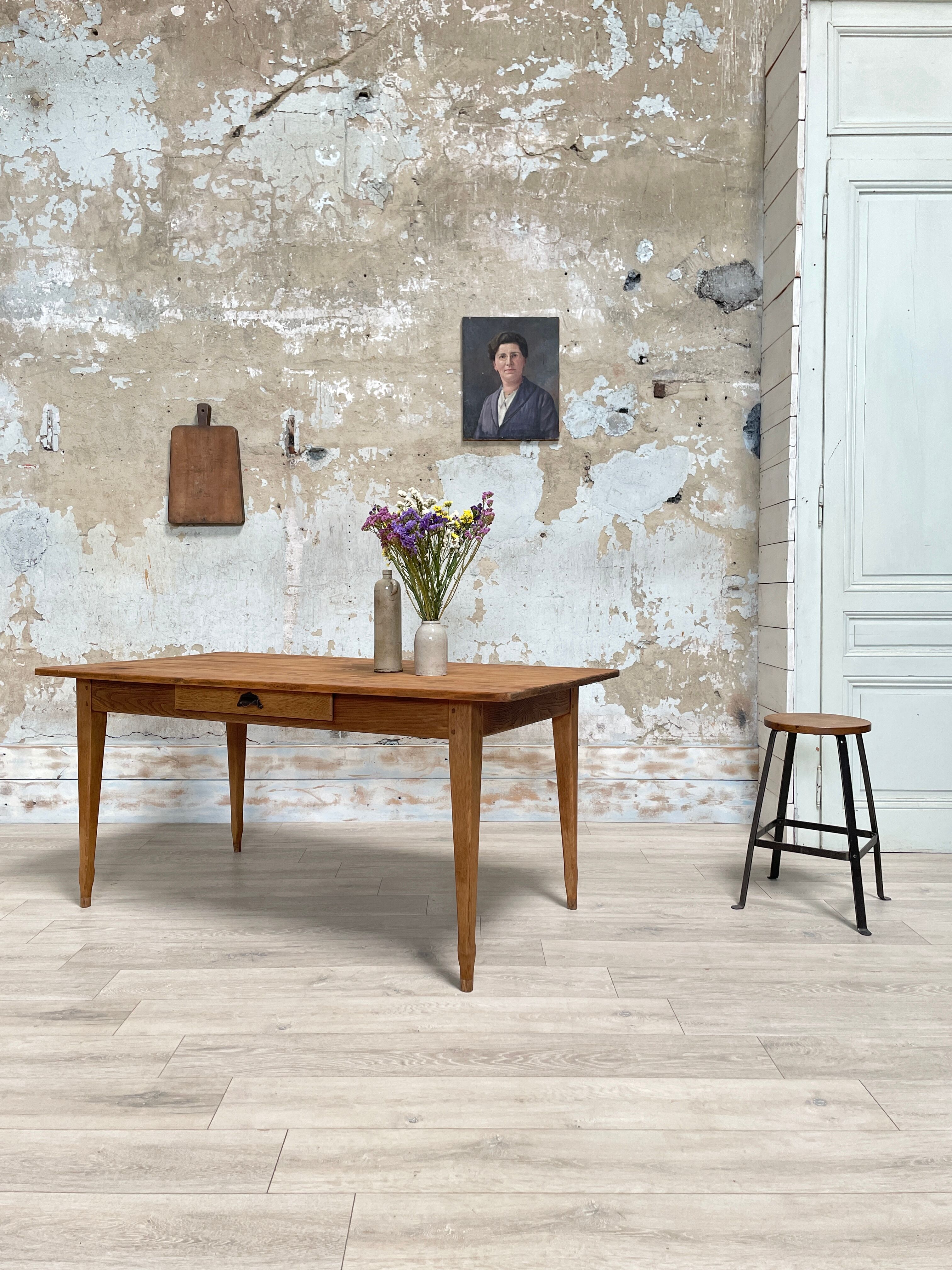 Vintage farmhouse table with spindle legs.