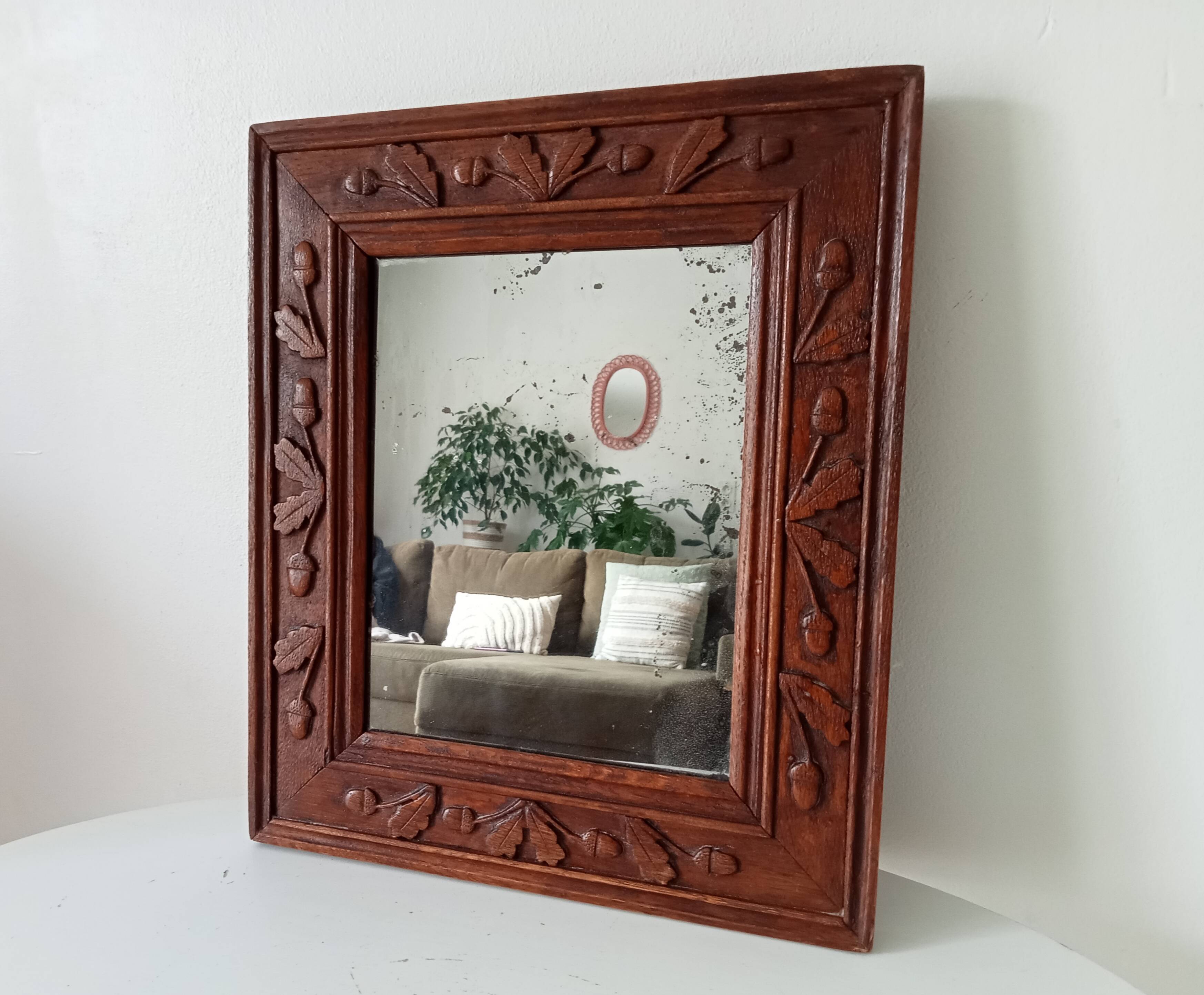Antique mirror in carved wood