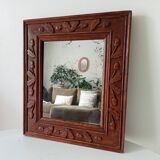 Antique mirror in carved wood
