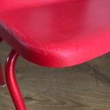 Red child chair by robin day for ikea
