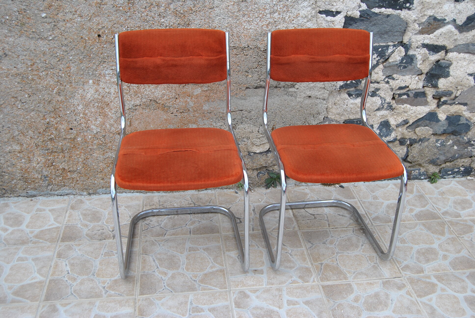Pair of orange velvet chairs Roche Bobois 70s