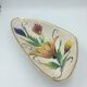 Triangular ceramic fruit basket