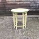 Yellow and green patinated pedestal table by a local artist