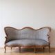 Three-seater canapé in grey mottled fabric, Louis Philippe style.