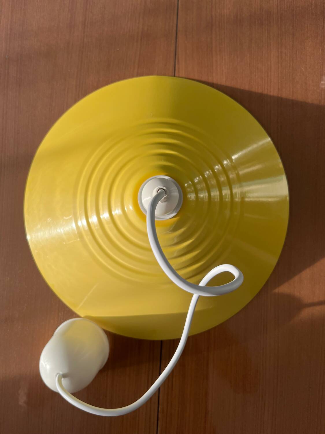 Yellow metal pendant light from the 80s
