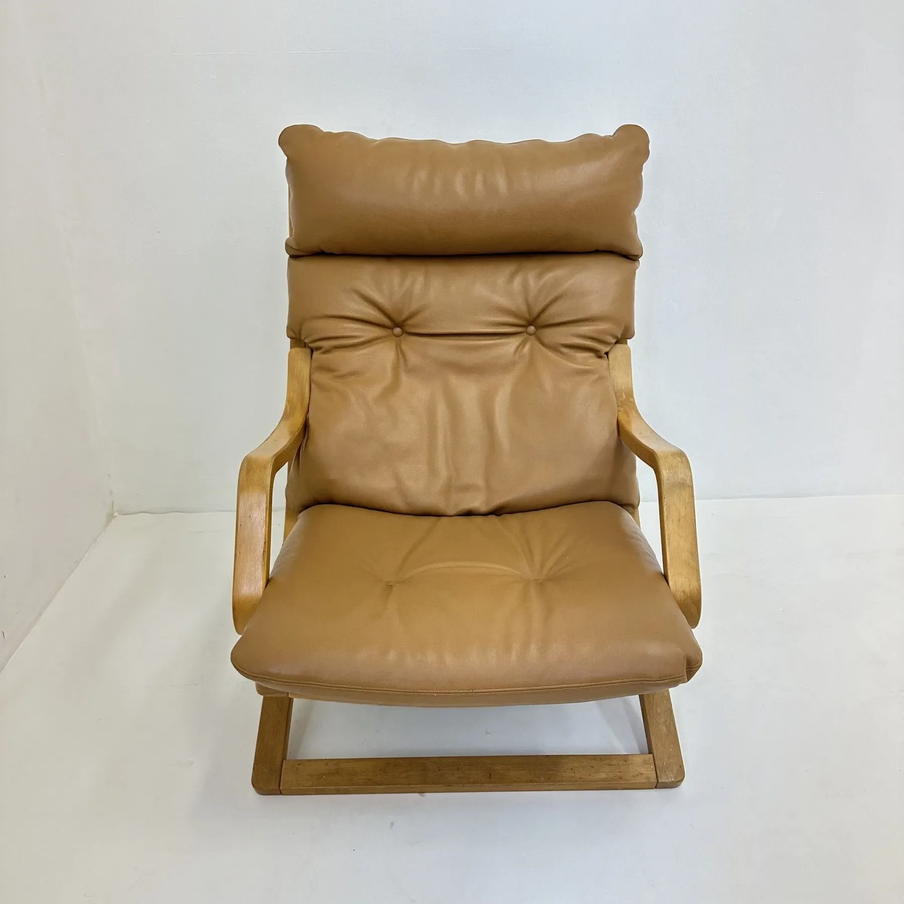 Vintage lounge chair cognac leather with webbing, 1970s