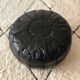 Contemporary leather full black pouf