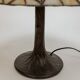Tiffany-style table lamp with stained glass shade