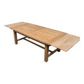 Solid oak farmhouse table with extensions.