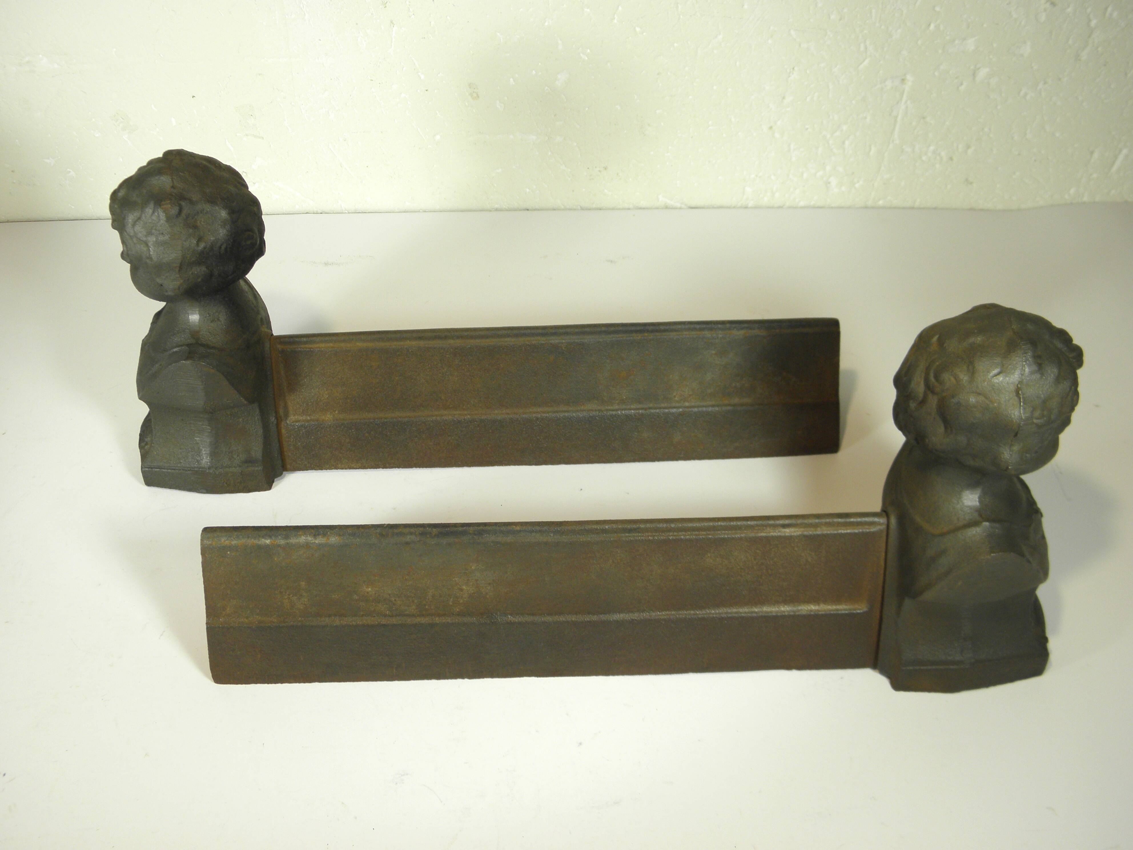 Pair of cast iron fire dogs
