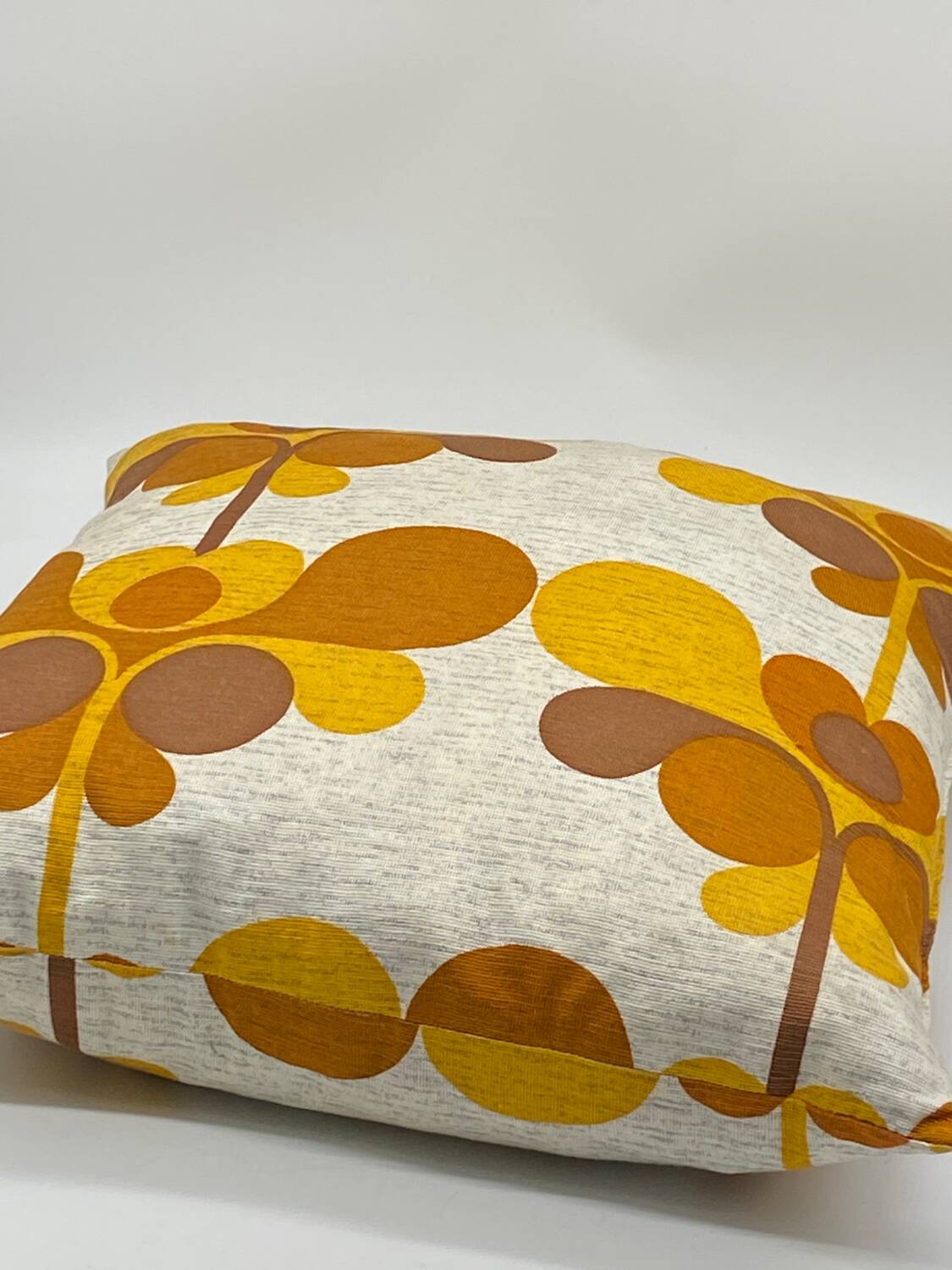 Vintage orange/brown cushion with stylized flowers
