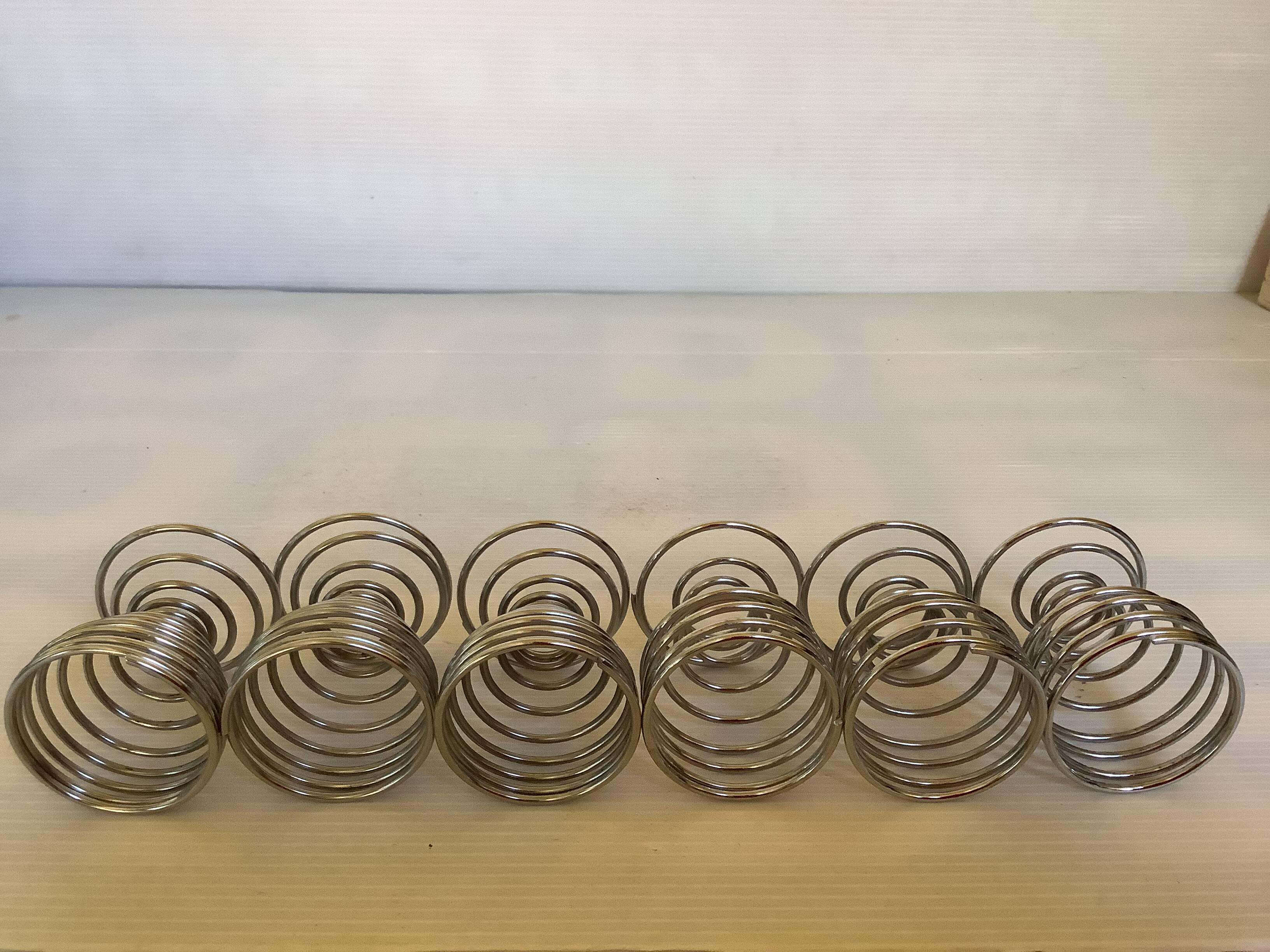 Six spiral spring egg cups