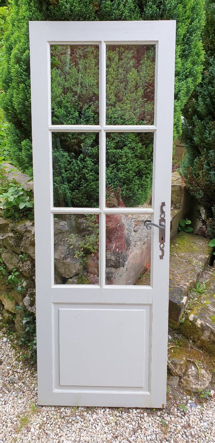 Old wooden door with small squares