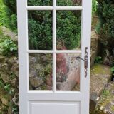 Old wooden door with small squares
