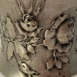 Art Nouveau round silver towel decoration of flowers around 1900