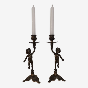 Pair of antique candlesticks in bronze and brass