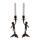 Pair of antique candlesticks in bronze and brass
