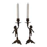 Pair of antique candlesticks in bronze and brass