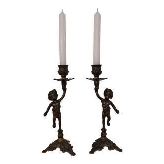 Pair of antique candlesticks in bronze and brass