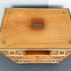 Antique campaign chest / ship’s chest, England, 1940s. Mahogany with a distinctive grain, brass inlays and hardware.