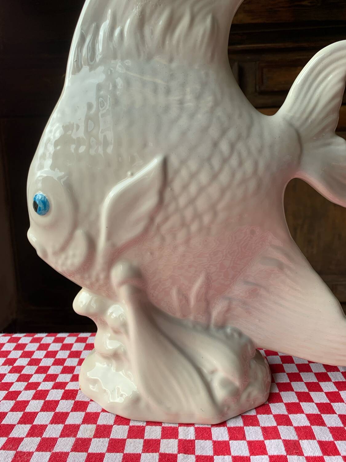 Large white ceramic fish to place.
