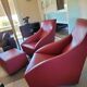 Doda Molteni leather armchairs and pouf