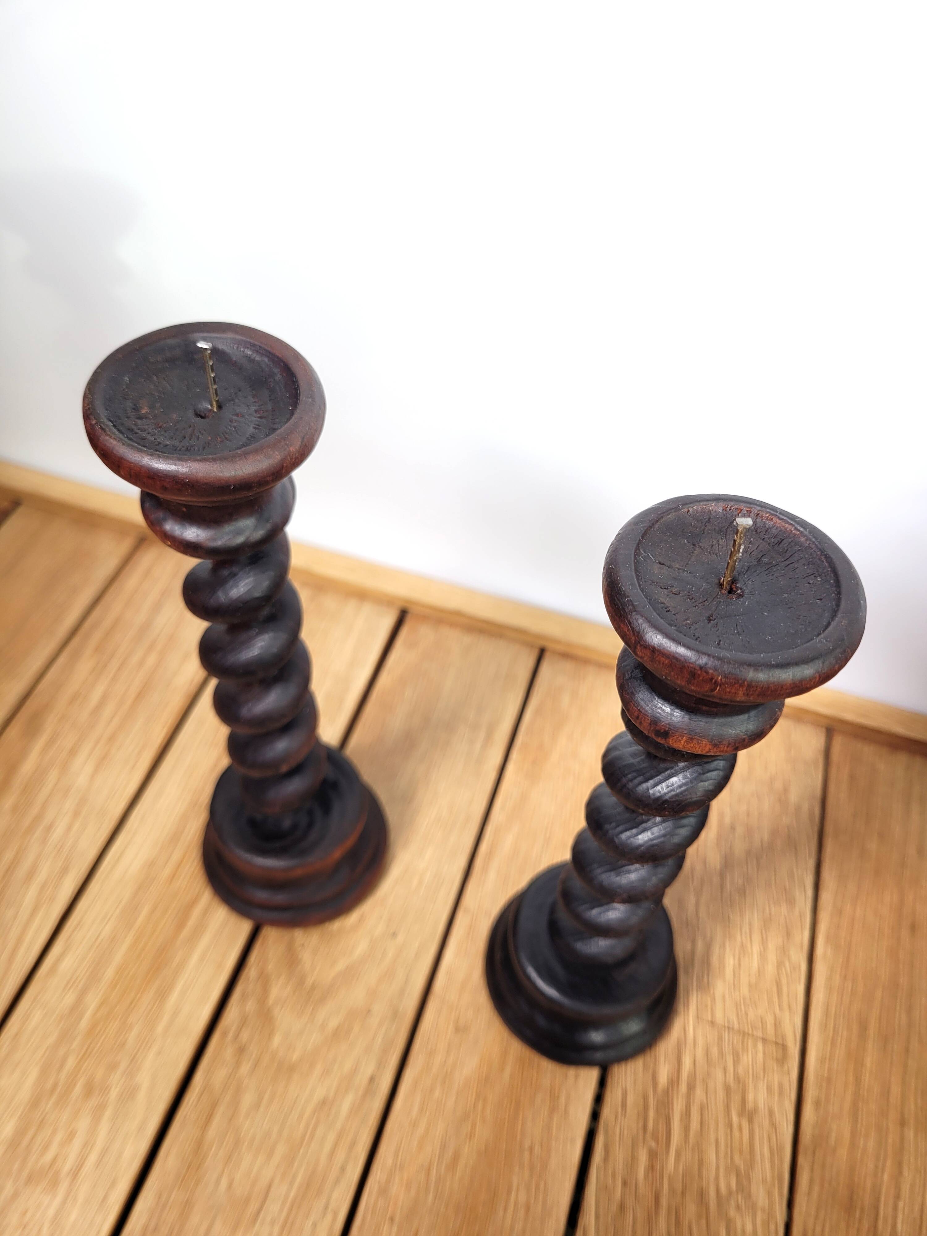 Pair of old turned wooden candlesticks