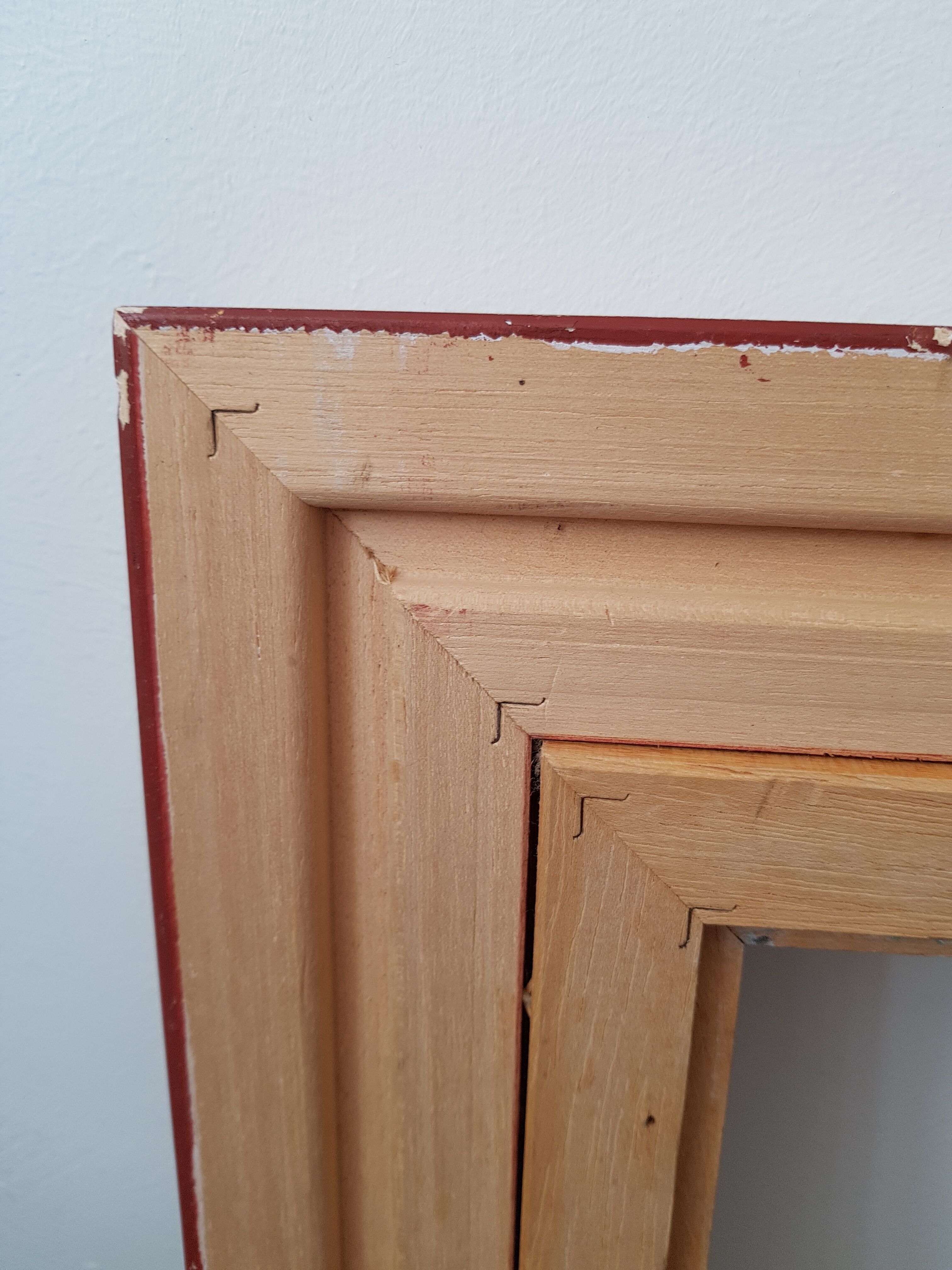 Framed black gilded wood and cream fabric