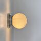 Pair of vintage modernist Art Deco wall lights, chrome and opaline, France