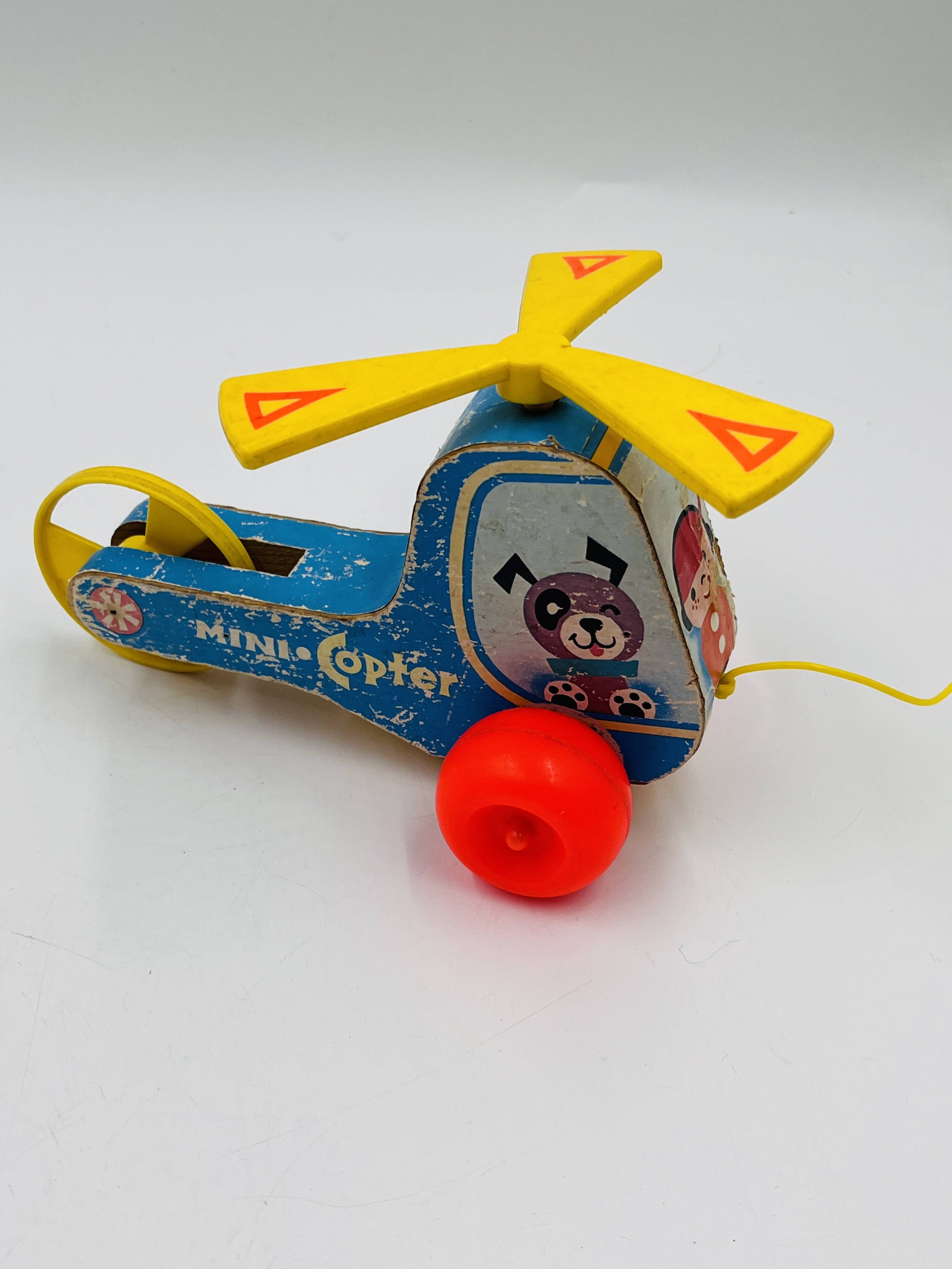Set of 4 Fisher-Price wooden toys from the 1960s