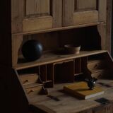 Old Danish secretary in pine with drop-down front and upper cabinet, mid-19th century.