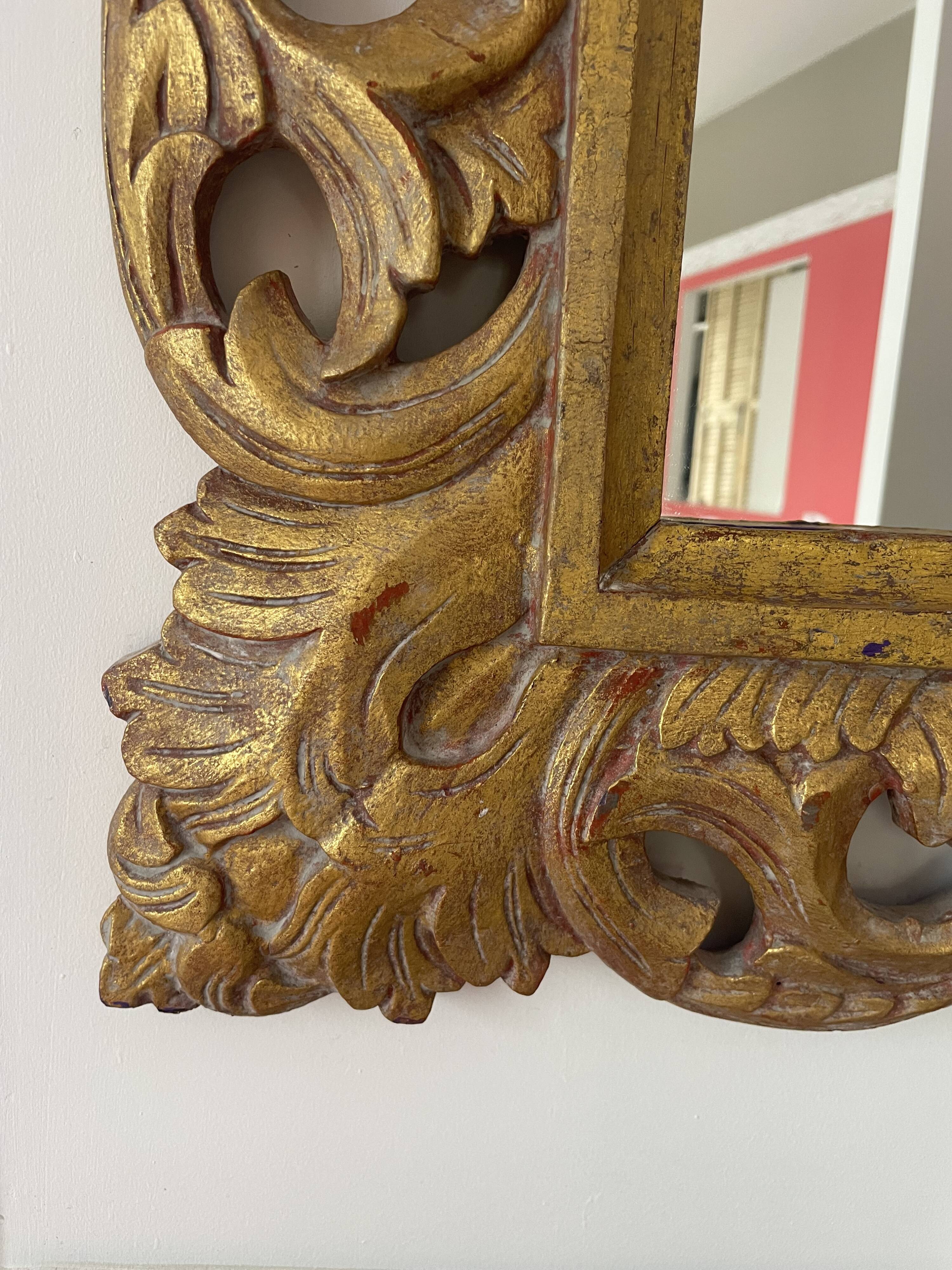 2 carved rectangular wooden mirrors, golden patina