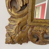 2 miroirs rectangulaires en bois sculptés, patine dorée
