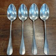 Set of 4 large spoons in the Vieux Paris style in silver-plated metal.