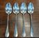 Set of 4 large spoons in the Vieux Paris style in silver-plated metal.