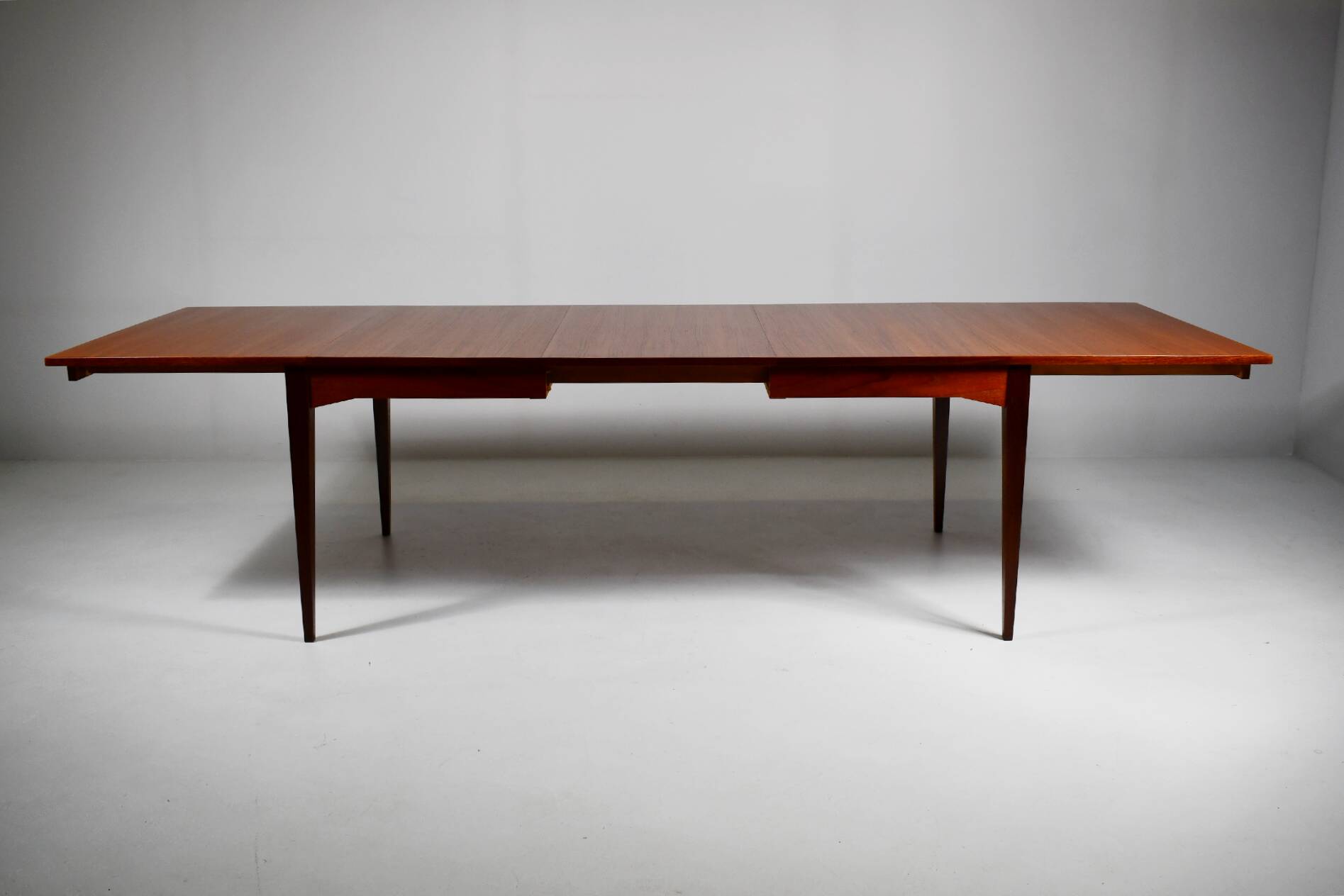Large teak dining table. 1960s.