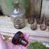 Set of 10 brown glasses and a carafe made in Belgium