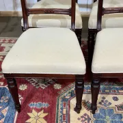 Set of 2 armchairs and 6 English mahogany chairs from the 1950s.