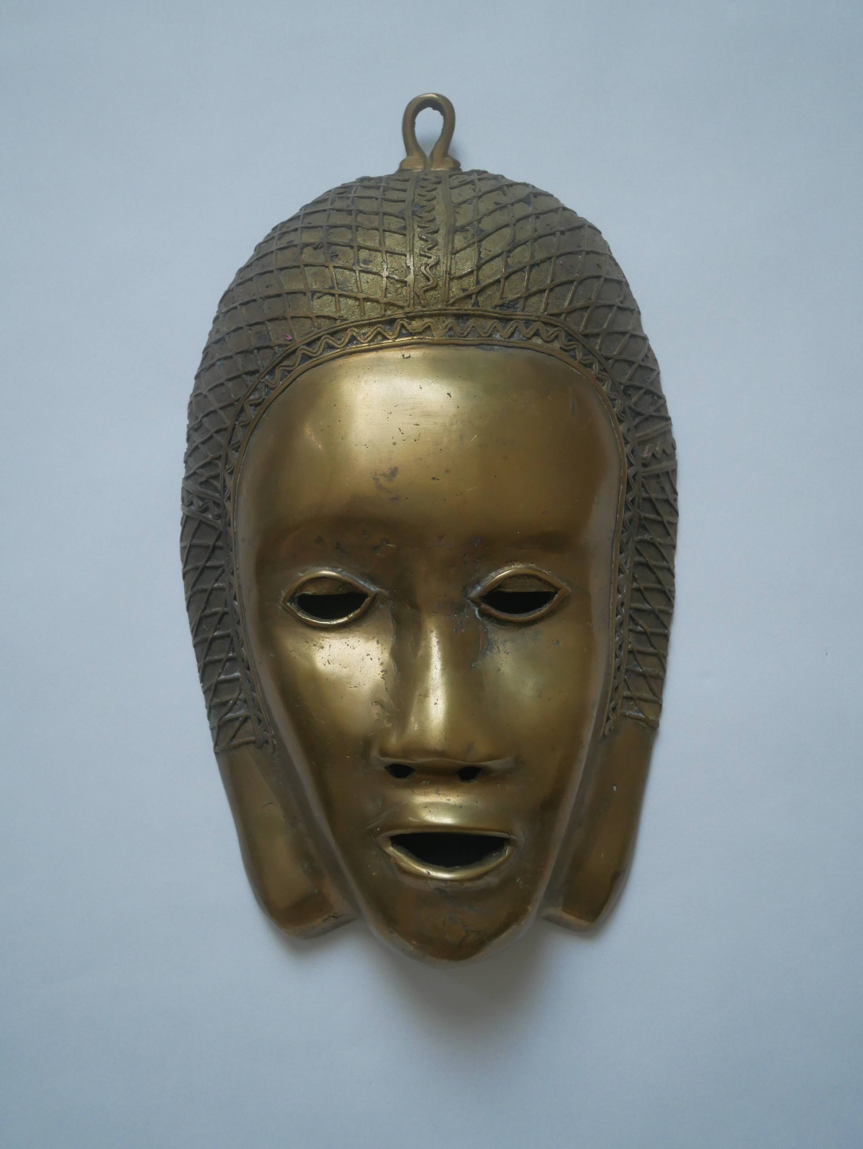Brass mask wall sculpture ethnic decorative object Tribal art