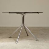 Round table in smoked glass and chrome metal from the 70s